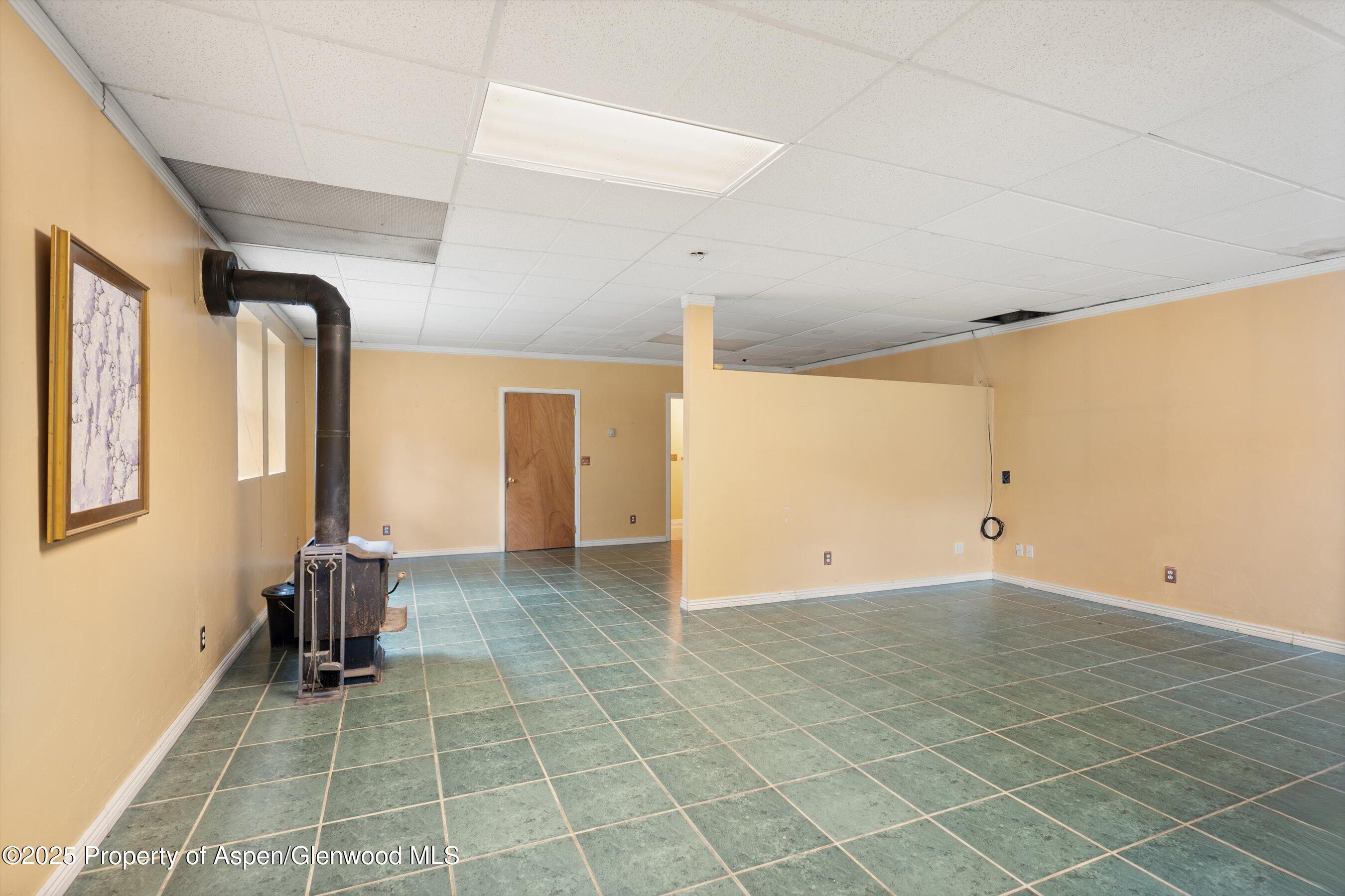 111 Ridge Trail Aspen, CO 81611 - Photo 29 of 37 a view of empty room with wooden floor and fan