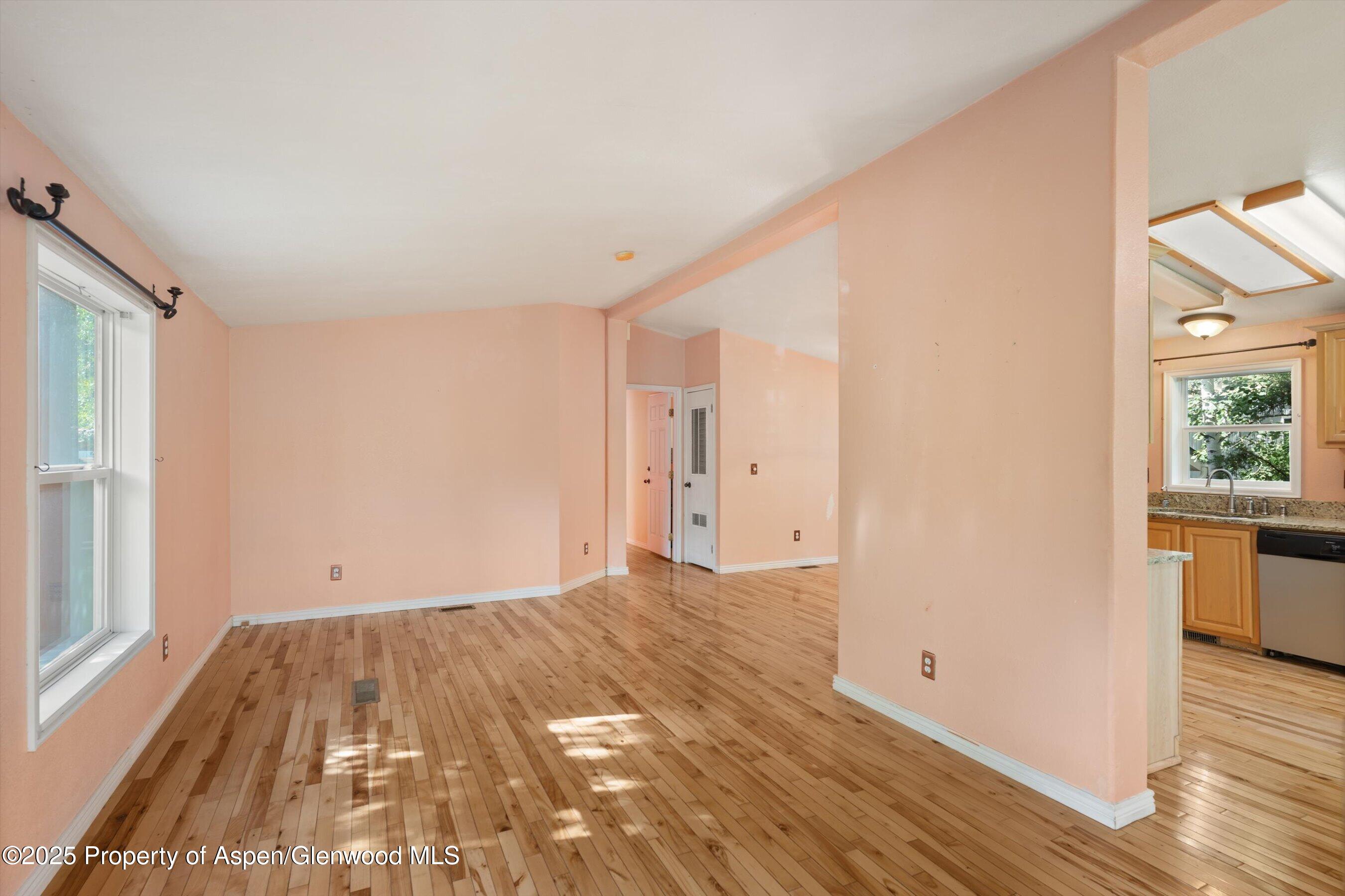 111 Ridge Trail Aspen, CO 81611 - Photo 8 of 37 a view of a room with wooden floor and a window