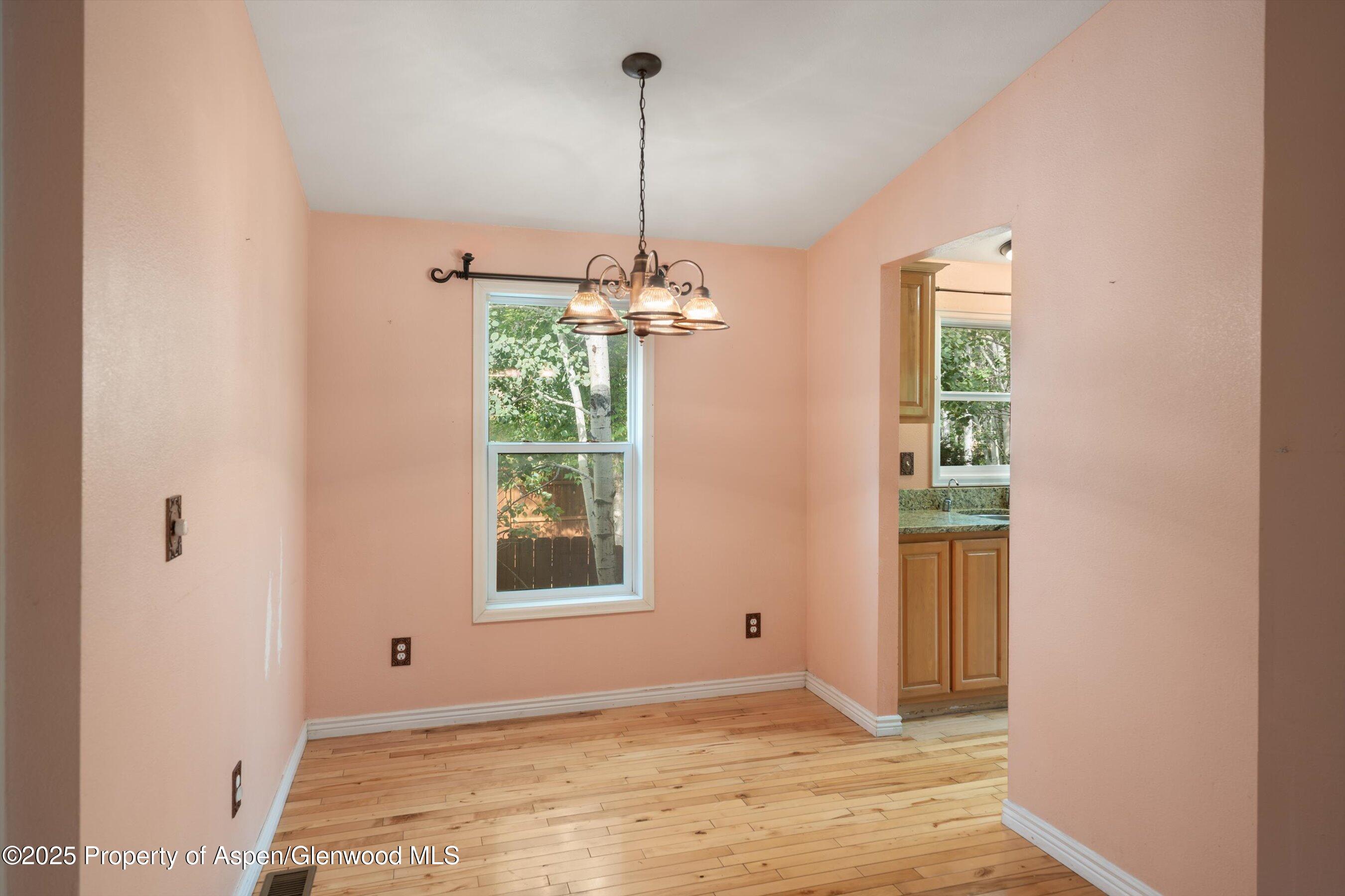 111 Ridge Trail Aspen, CO 81611 - Photo 10 of 37 a view of a room with window and chandelier
