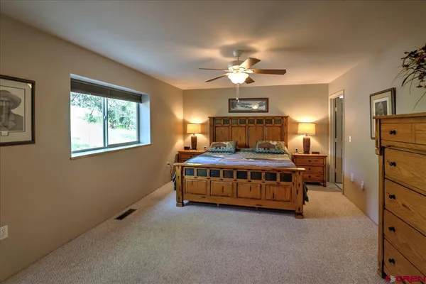a room with furniture and gym equipment