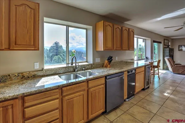 a utility room with a sink dryer and washer