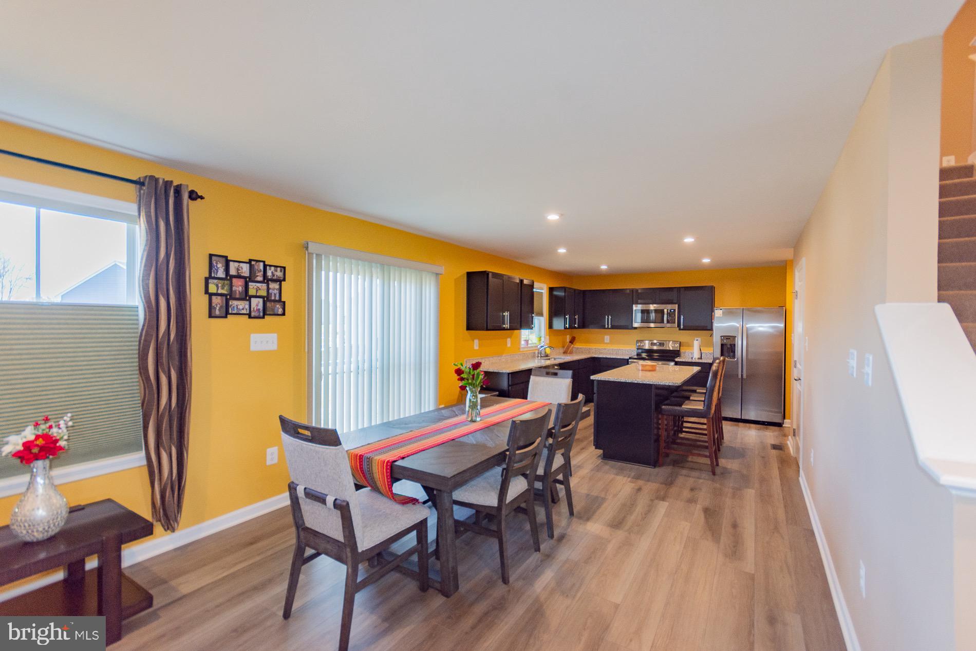 236 Surplus Road Inwood, WV 25428 - Photo 14 of 72 a view of a dining room with furniture and a window