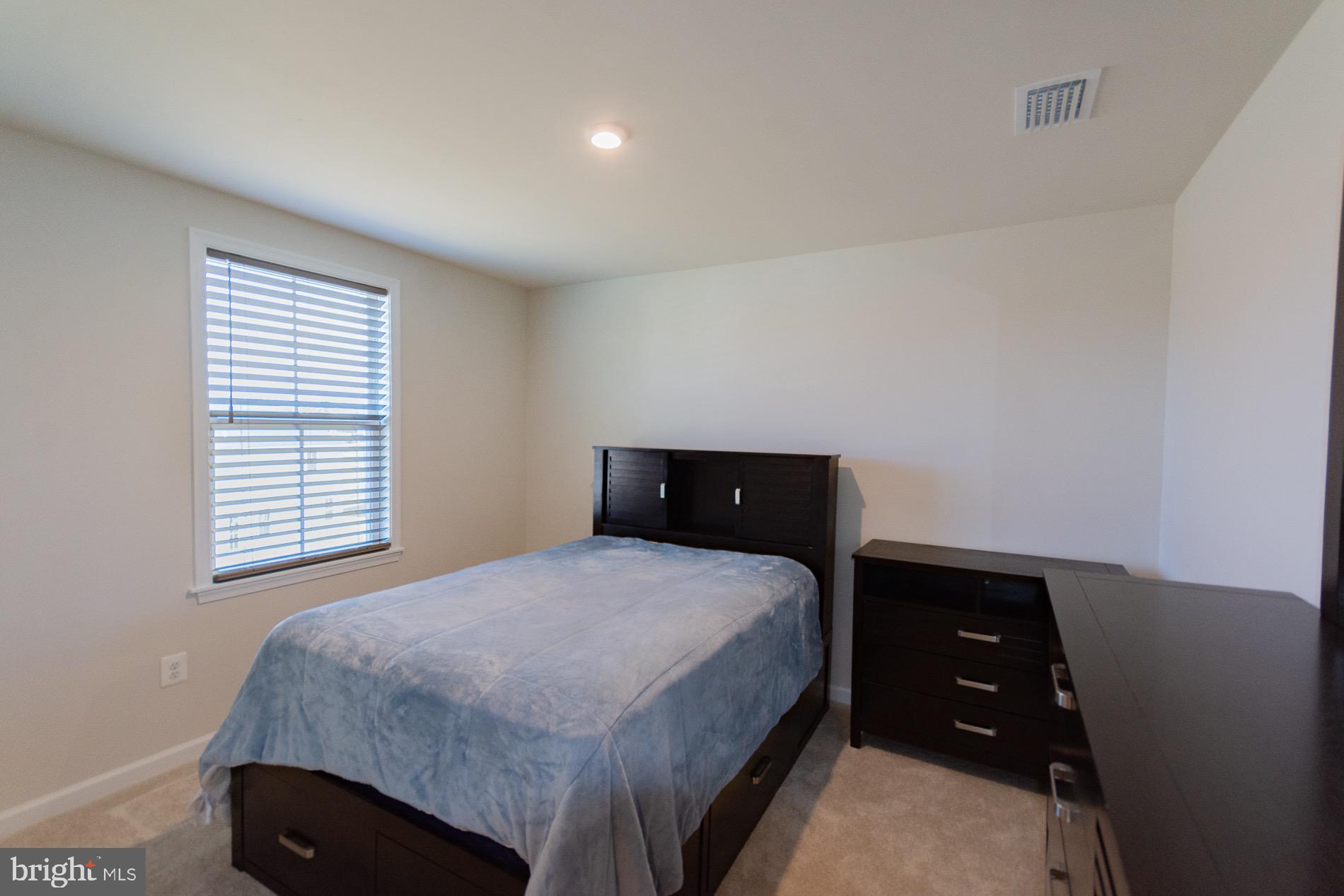 236 Surplus Road Inwood, WV 25428 - Photo 42 of 72 a bedroom with a bed and a closet