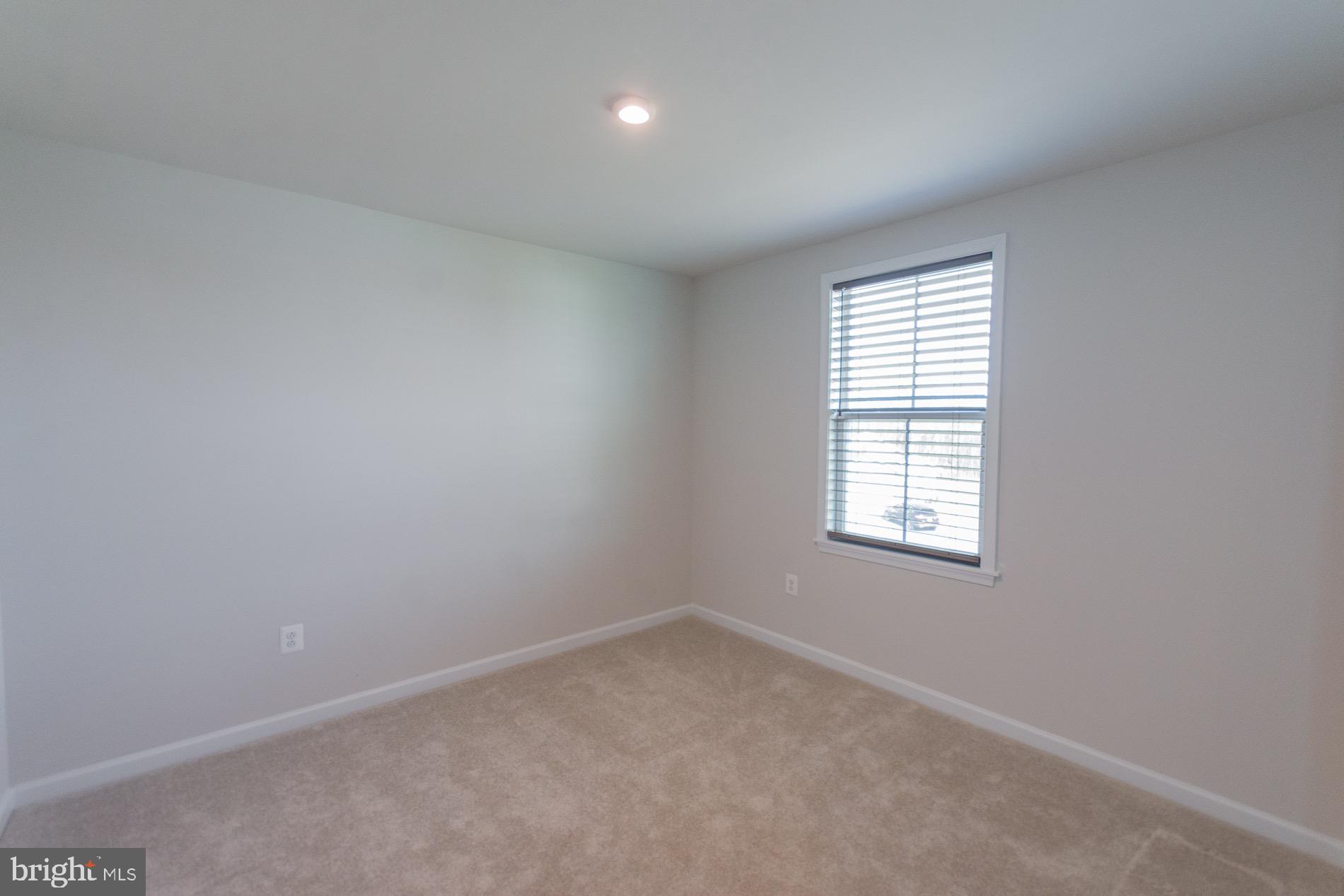 236 Surplus Road Inwood, WV 25428 - Photo 47 of 72 an empty room with a window