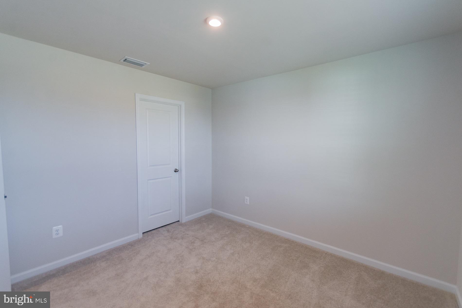 236 Surplus Road Inwood, WV 25428 - Photo 50 of 72 an empty room with a empty space