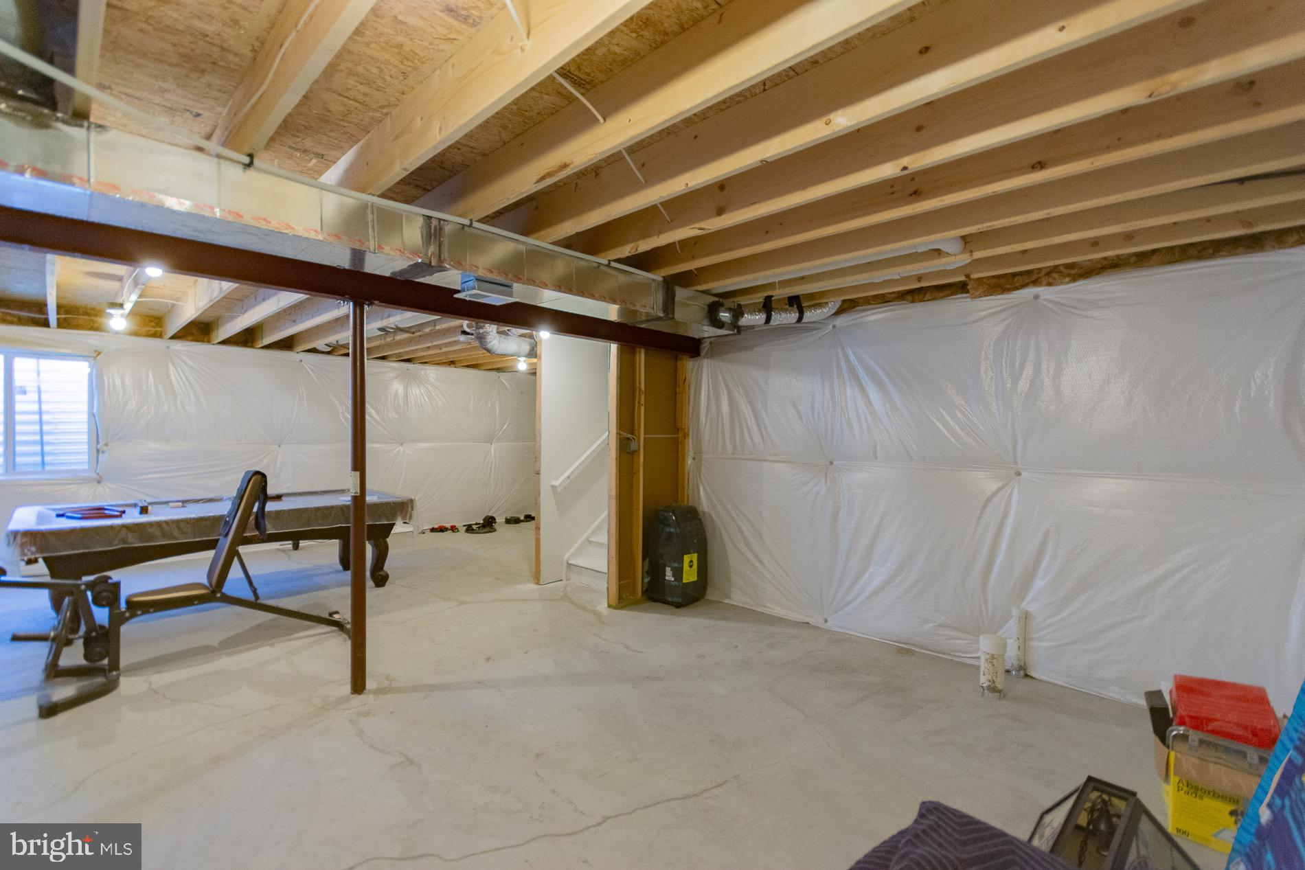 236 Surplus Road Inwood, WV 25428 - Photo 52 of 72 a view of a room with table and chairs