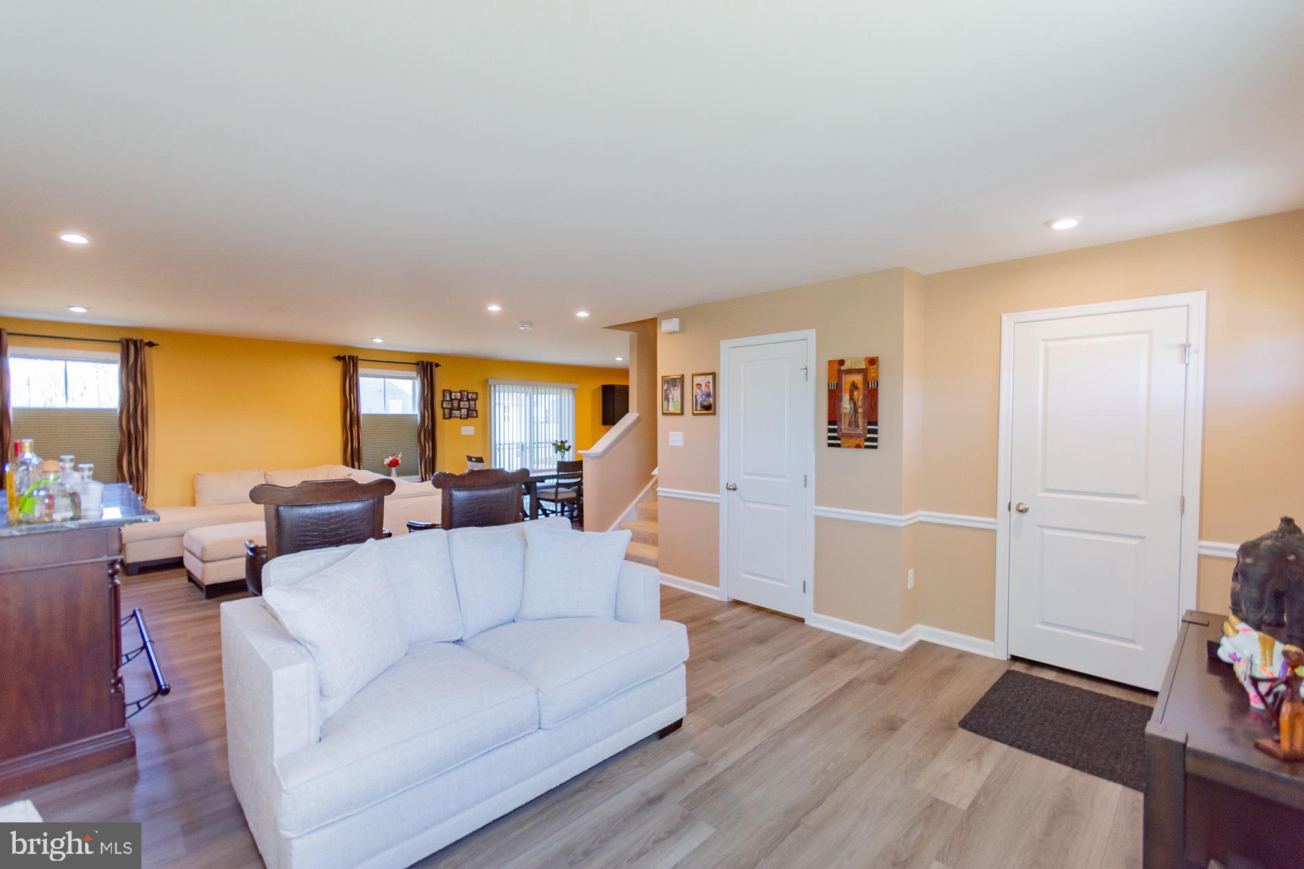 236 Surplus Road Inwood, WV 25428 - Photo 6 of 72 a living room with furniture and a wooden floor