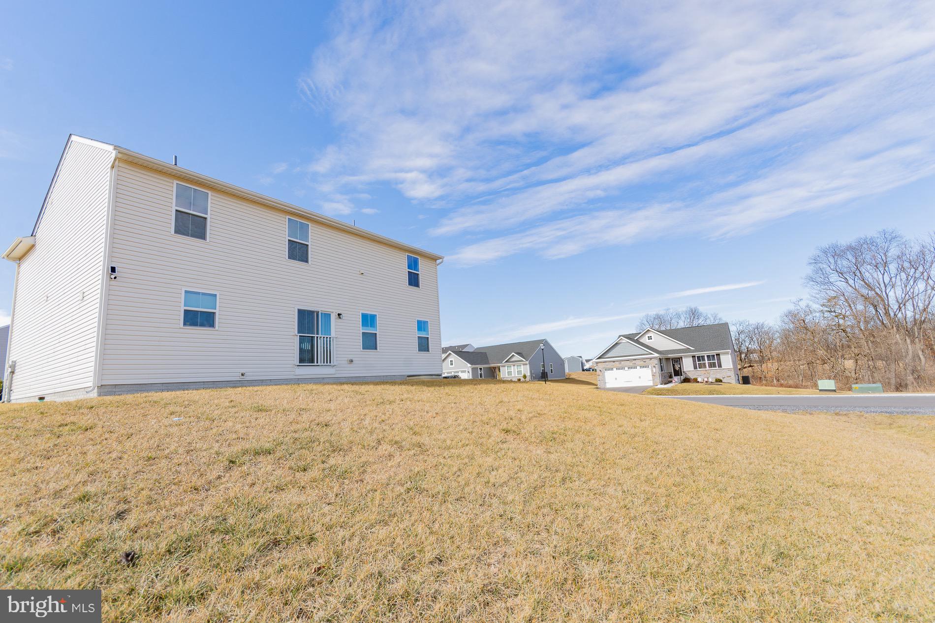 236 Surplus Road Inwood, WV 25428 - Photo 62 of 72 a view of a house with snow on the road