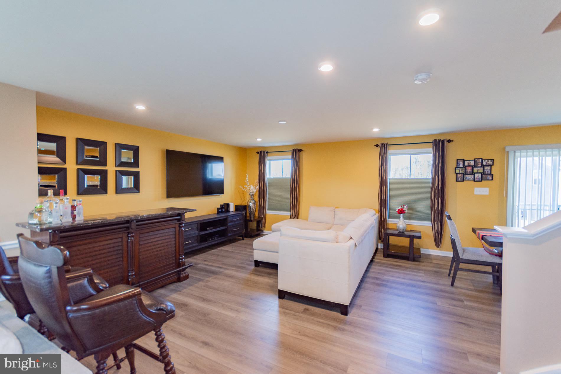 236 Surplus Road Inwood, WV 25428 - Photo 7 of 72 a living room with furniture and a flat screen tv