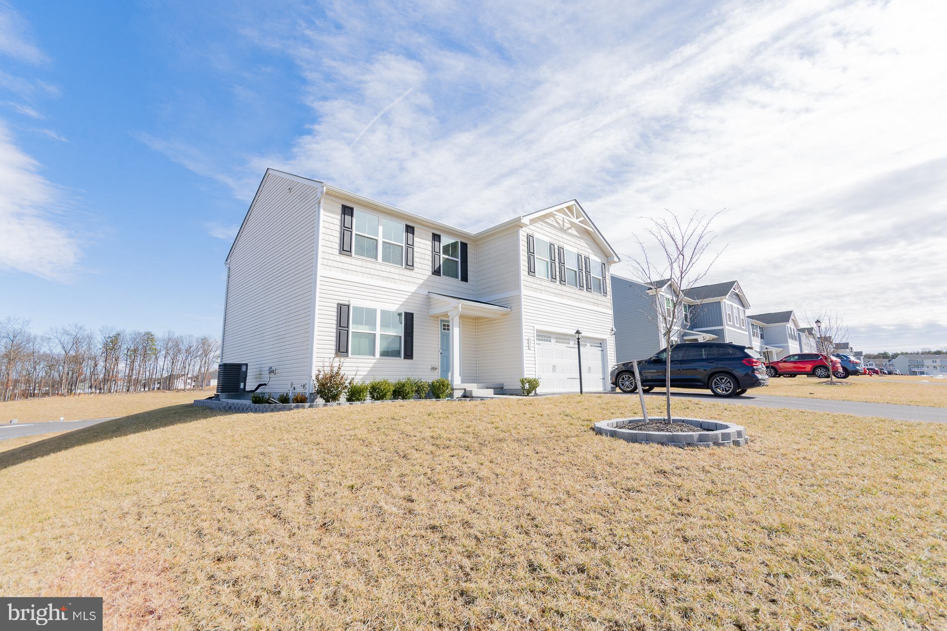 236 Surplus Road Inwood, WV 25428 - Photo 71 of 72 a car parked on the side of the road
