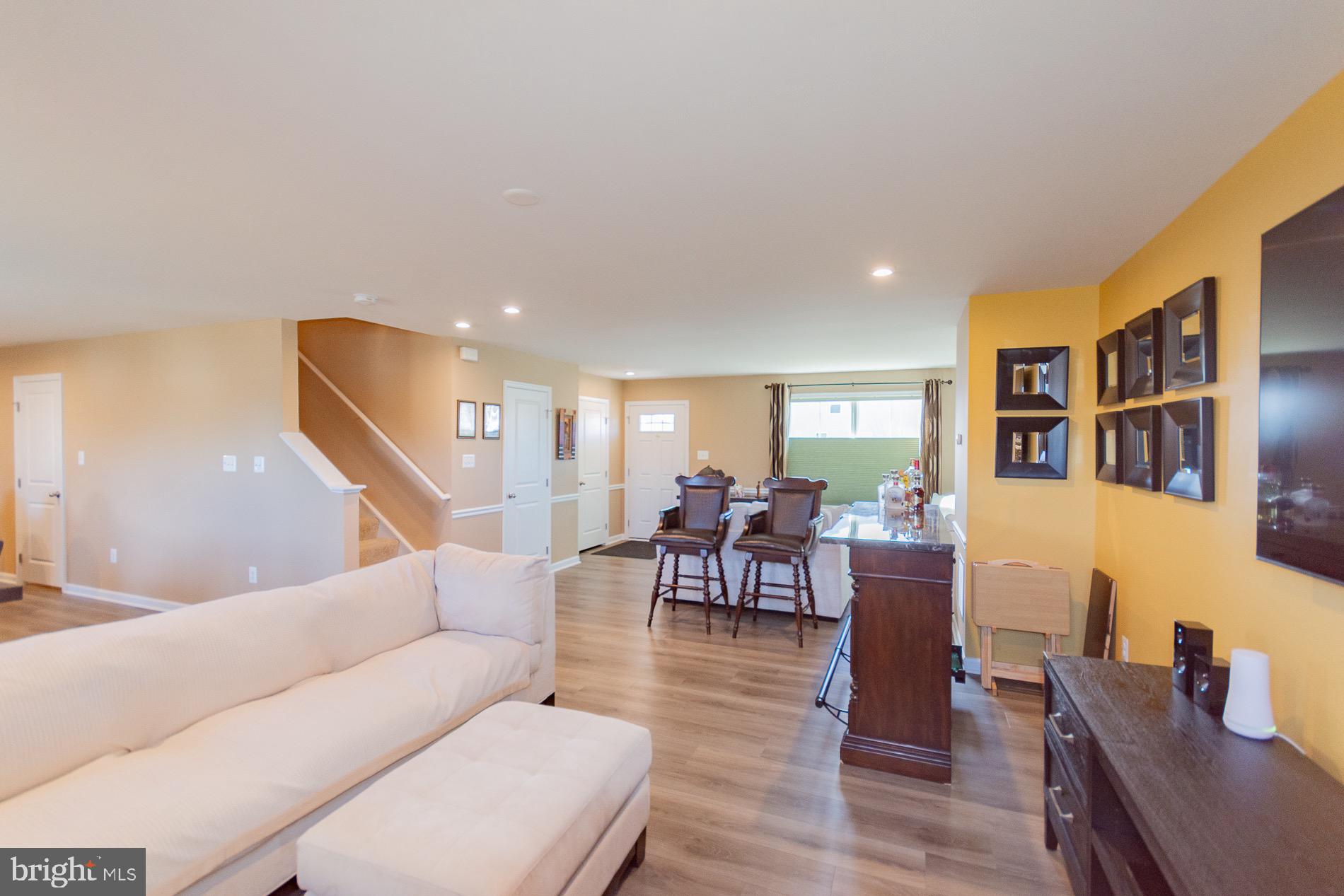 236 Surplus Road Inwood, WV 25428 - Photo 9 of 72 a living room with furniture and wooden floor