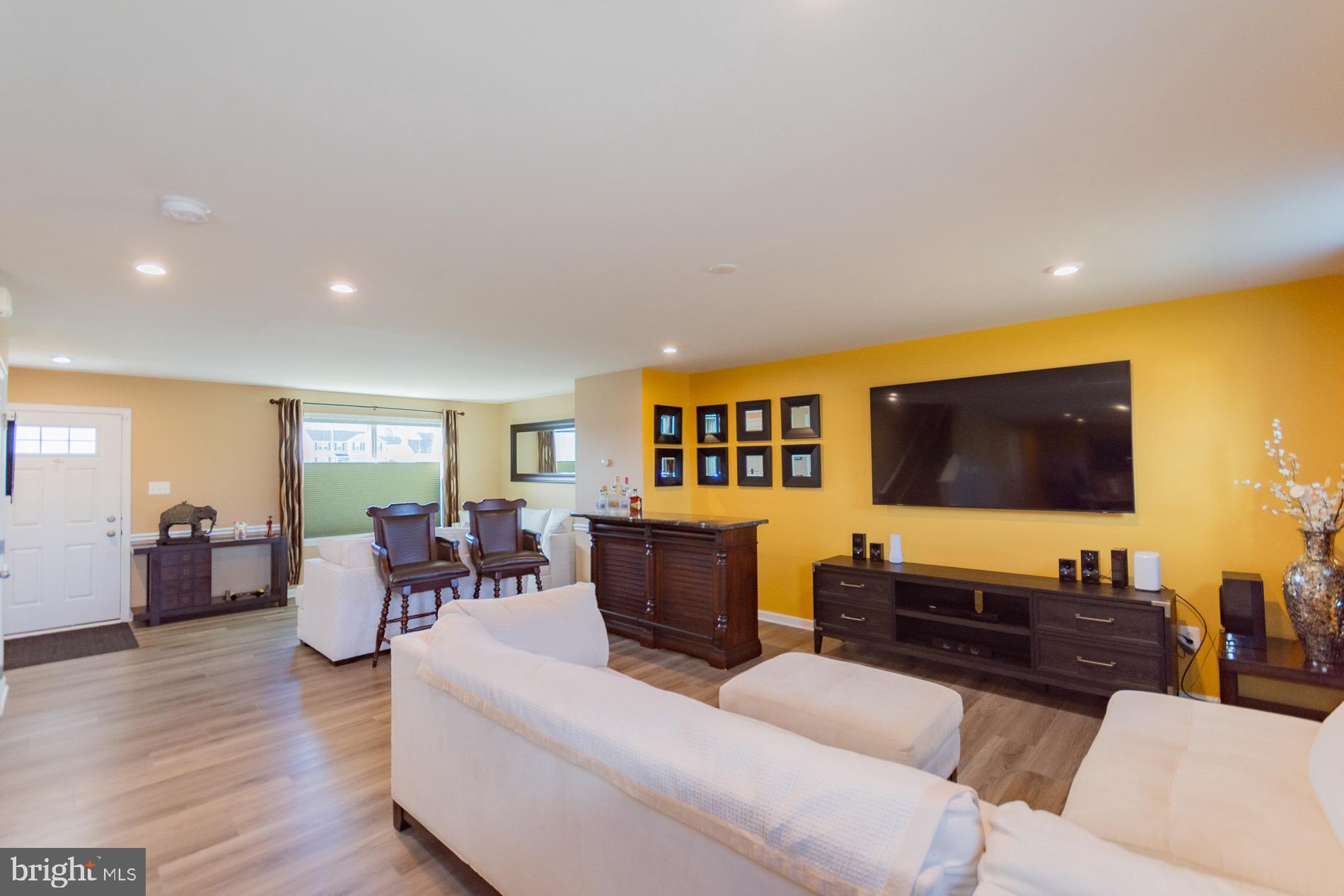 236 Surplus Road Inwood, WV 25428 - Photo 10 of 72 a living room with furniture and a flat screen tv