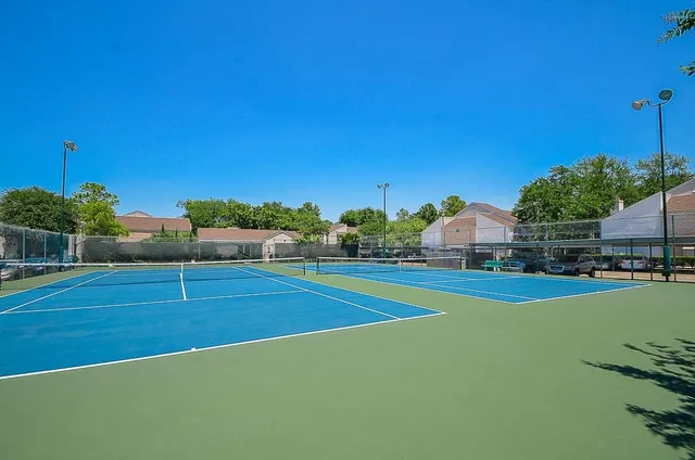 a view of a house with a big yard