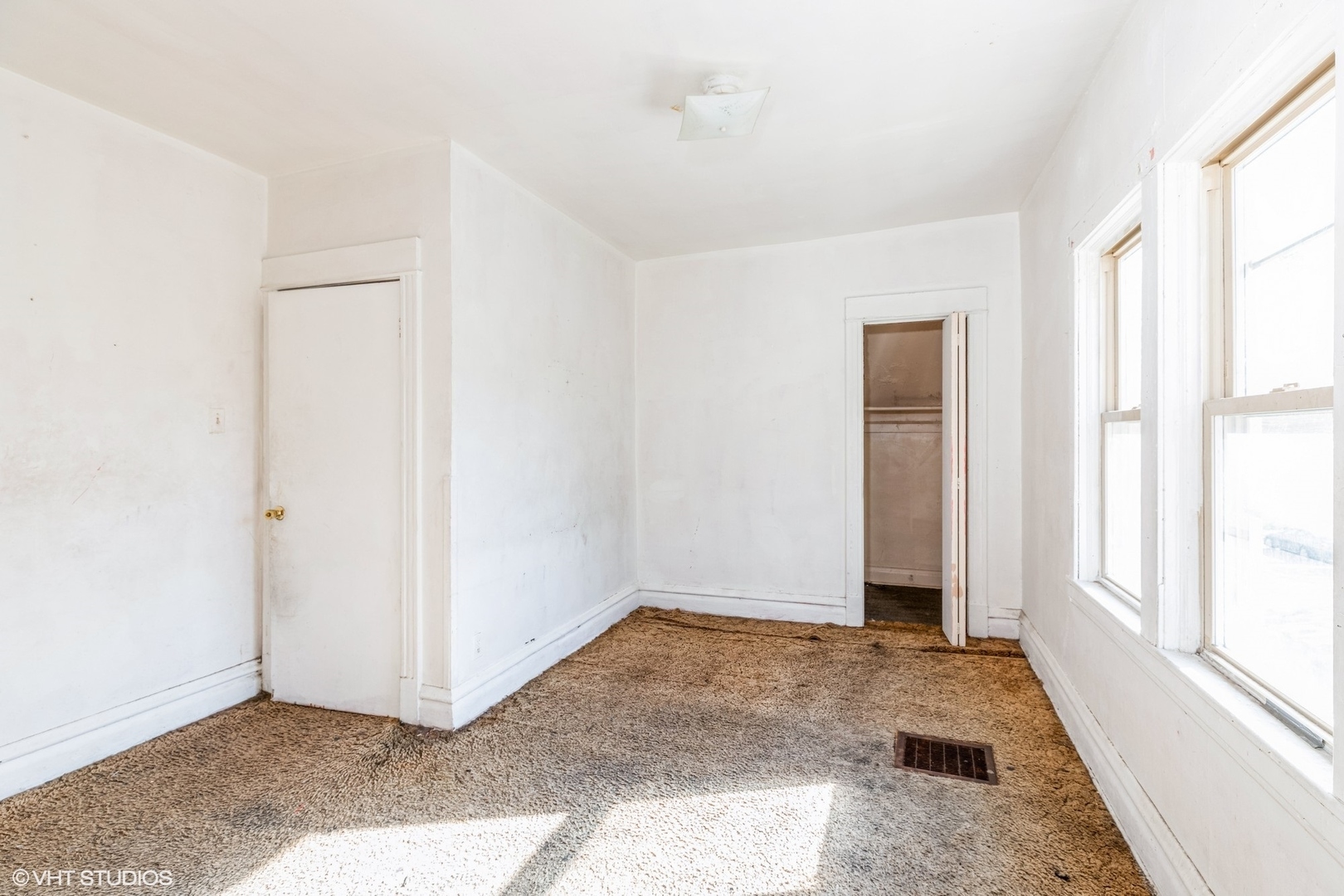 2022 West 68th Street Chicago, IL 60636 - Photo 5 of 10 a view of room with window and hardwood floor