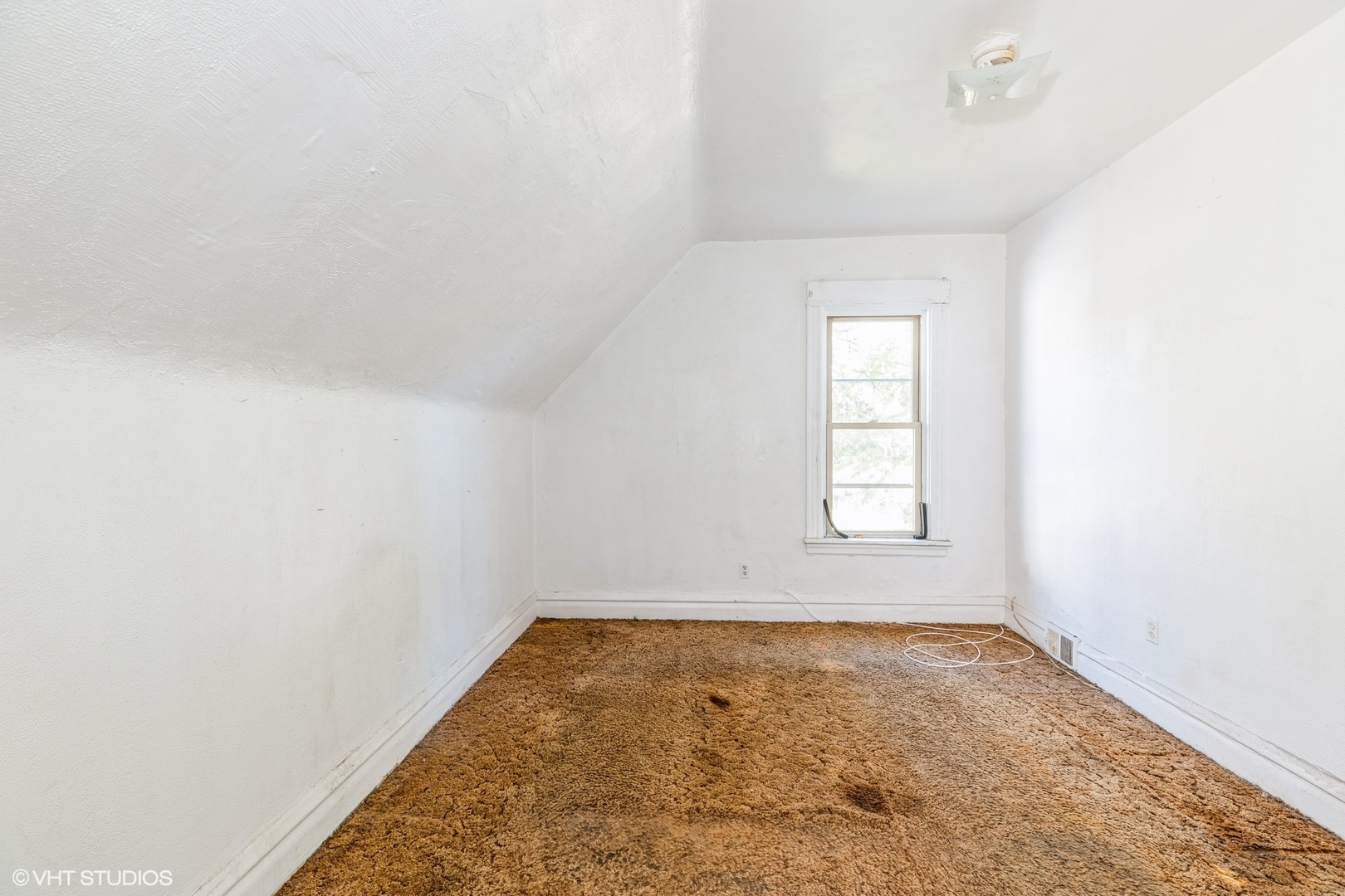 2022 West 68th Street Chicago, IL 60636 - Photo 6 of 10 an empty room with a window