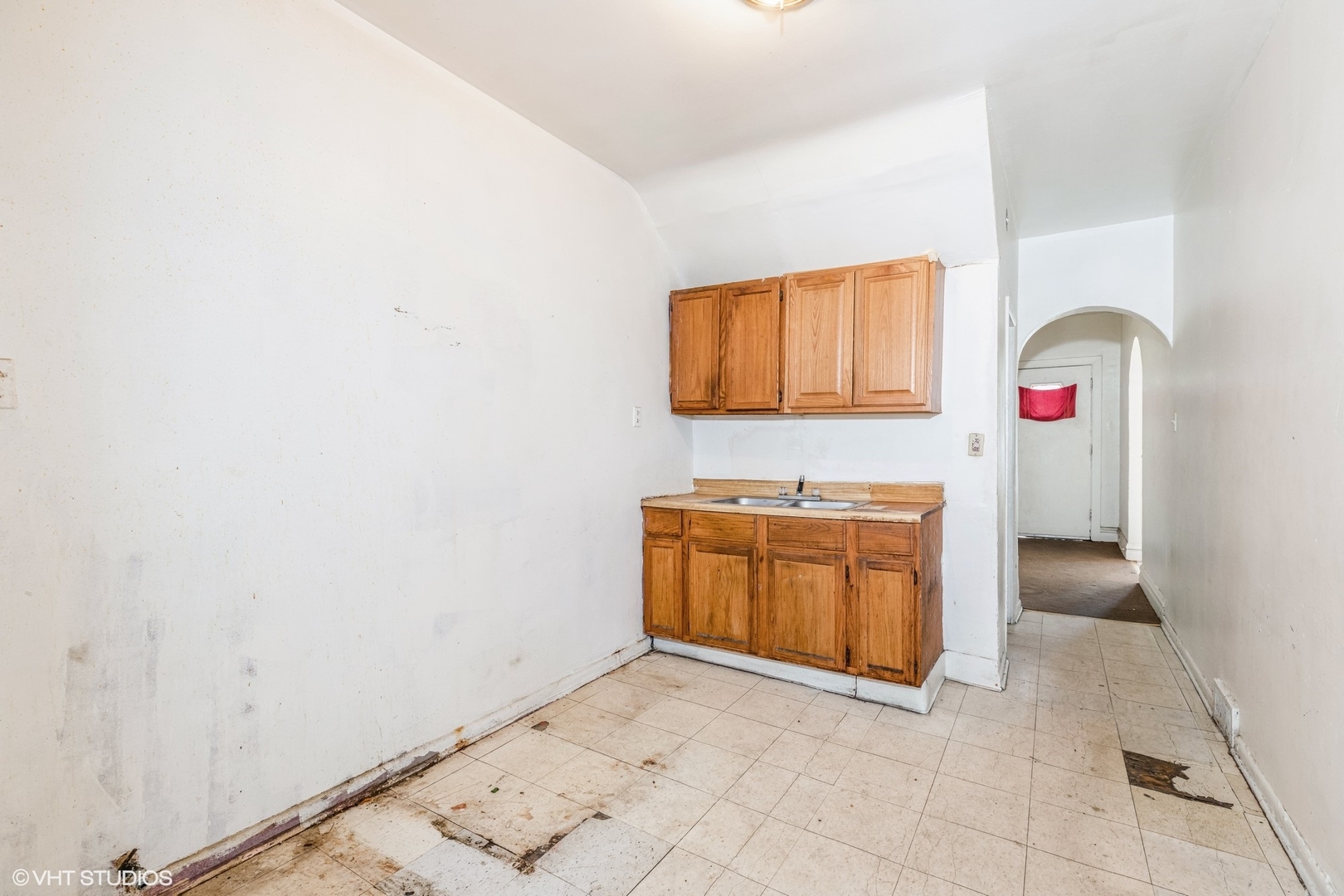 2022 West 68th Street Chicago, IL 60636 - Photo 8 of 10 a view of cabinet with washer and dryer