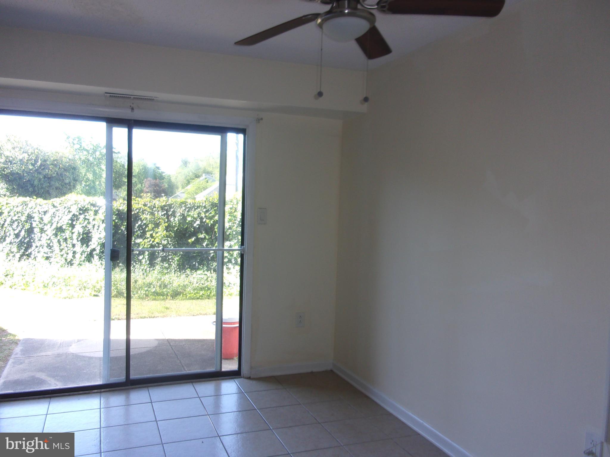 27 Chiswick Drive Lindenwold, NJ 08021 - Photo 4 of 12 a view of an empty room and window
