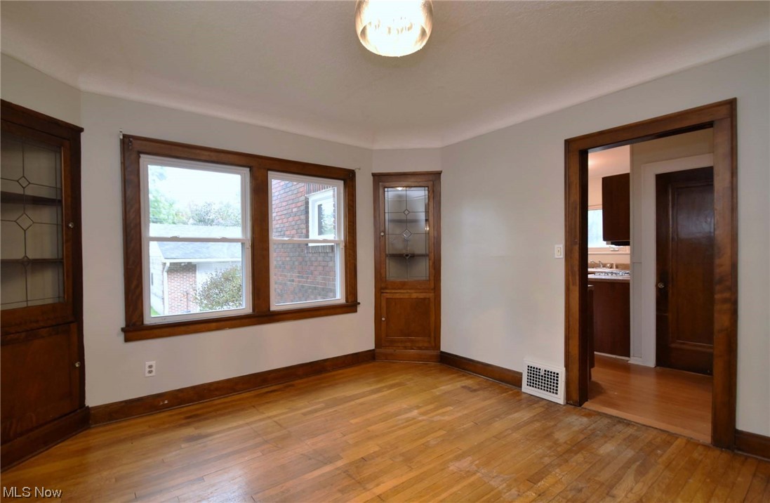 1135 Plainfield Road Cleveland, OH 44121 - Photo 10 of 32 Dining Room with Built in Corner Cabinets