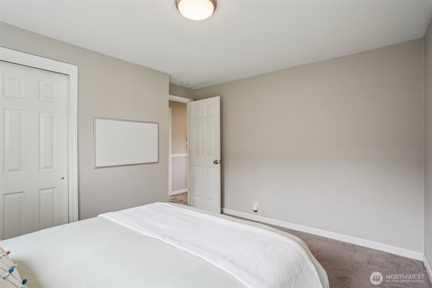 3709 Northeast 9th Court Renton, WA 98056 - Photo 11 of 21 a bedroom with a bed and a window