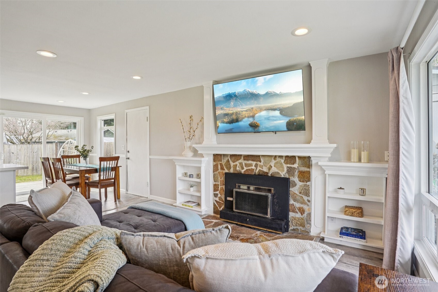 3709 Northeast 9th Court Renton, WA 98056 - Photo 7 of 21 a living room with furniture and a fireplace