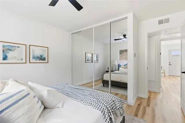 a bedroom with a bed and a view of bedroom