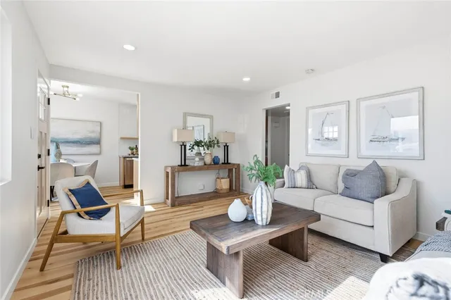 a living room with furniture and a table