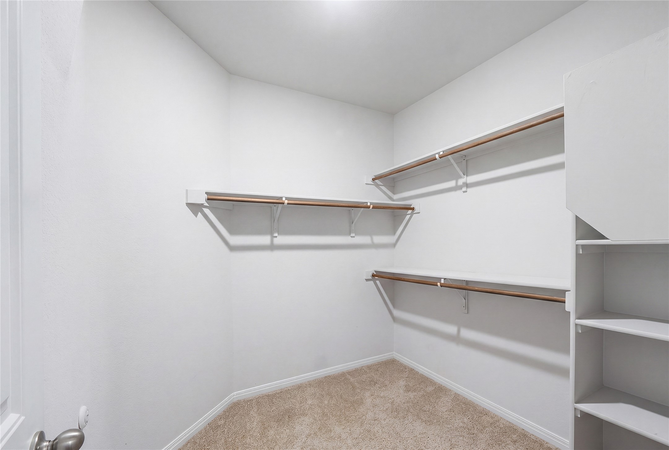217 Evergreen Sumac Loop Kyle, TX 78640 - Photo 13 of 20 Ample shelving and hanging space offer organized storage in this well-appointed closet.