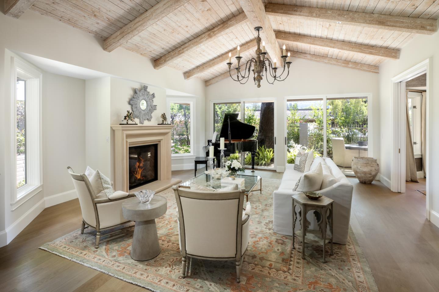 620 Morningside Circle Los Altos, CA 94022 - Photo 11 of 32 a living room with patio furniture and a fireplace