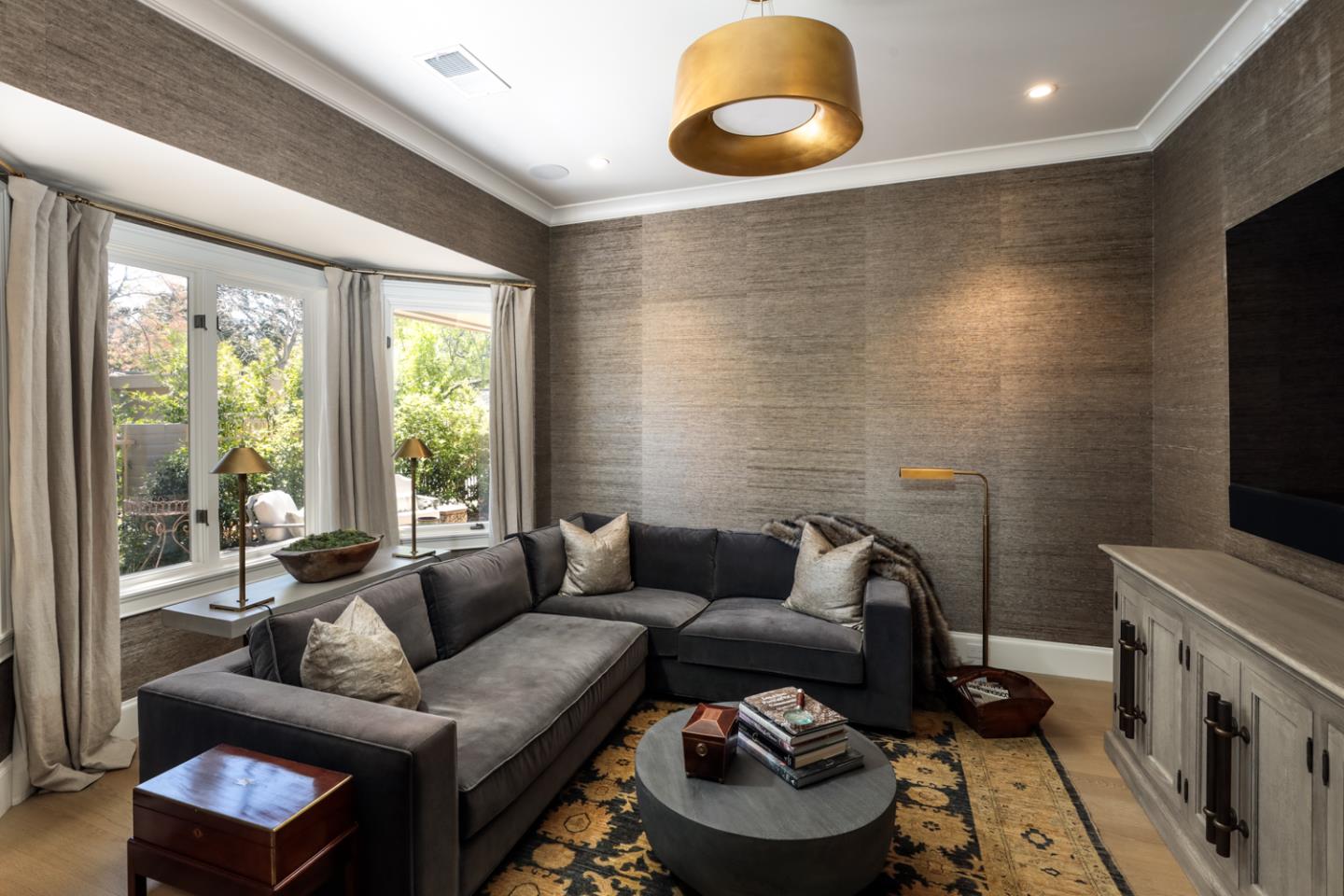 620 Morningside Circle Los Altos, CA 94022 - Photo 13 of 32 a living room with furniture and a flat screen tv