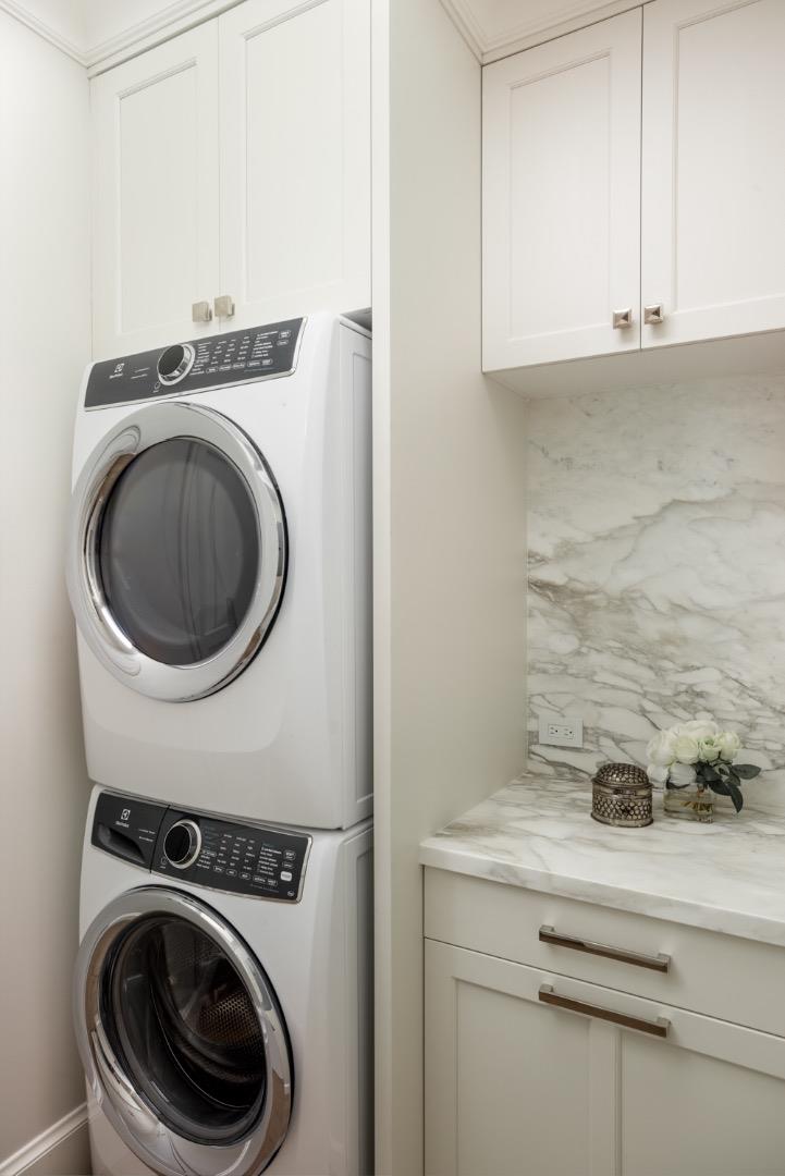 620 Morningside Circle Los Altos, CA 94022 - Photo 15 of 32 a view of a storage and utility room with washer and dryer