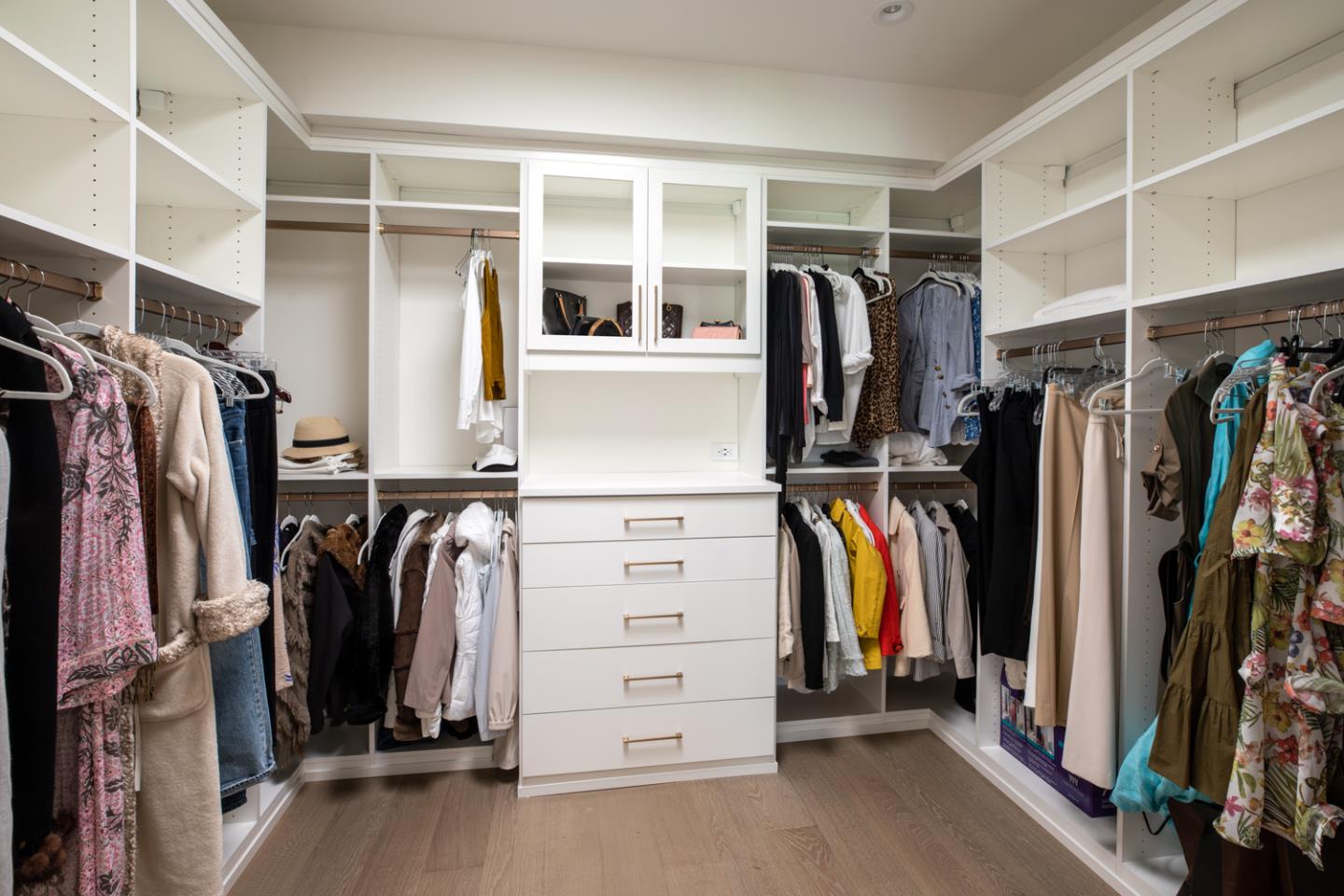 620 Morningside Circle Los Altos, CA 94022 - Photo 25 of 32 a view of walk in closet with clothes and shoes