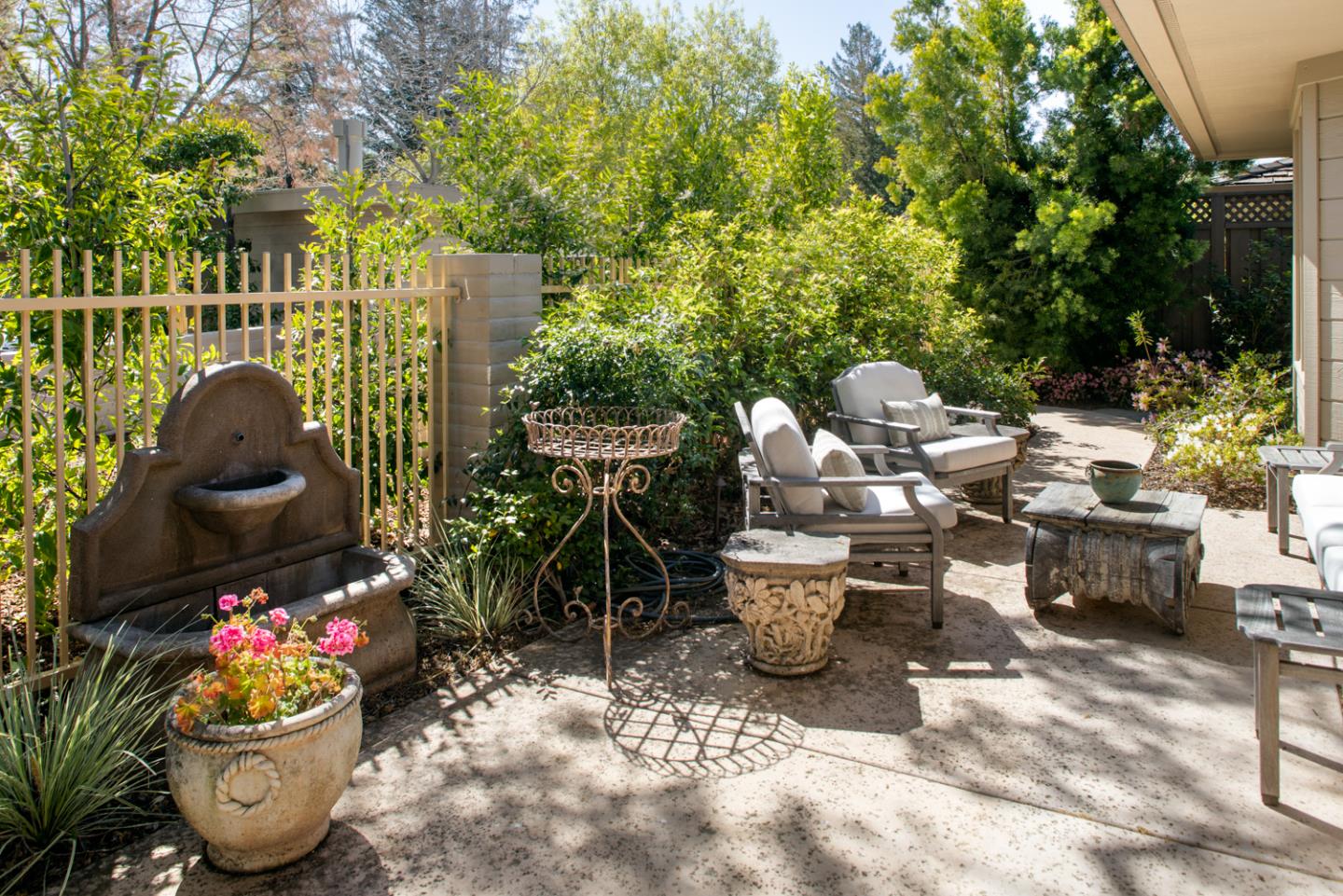 620 Morningside Circle Los Altos, CA 94022 - Photo 27 of 32 a room with lots of potted plants and trees