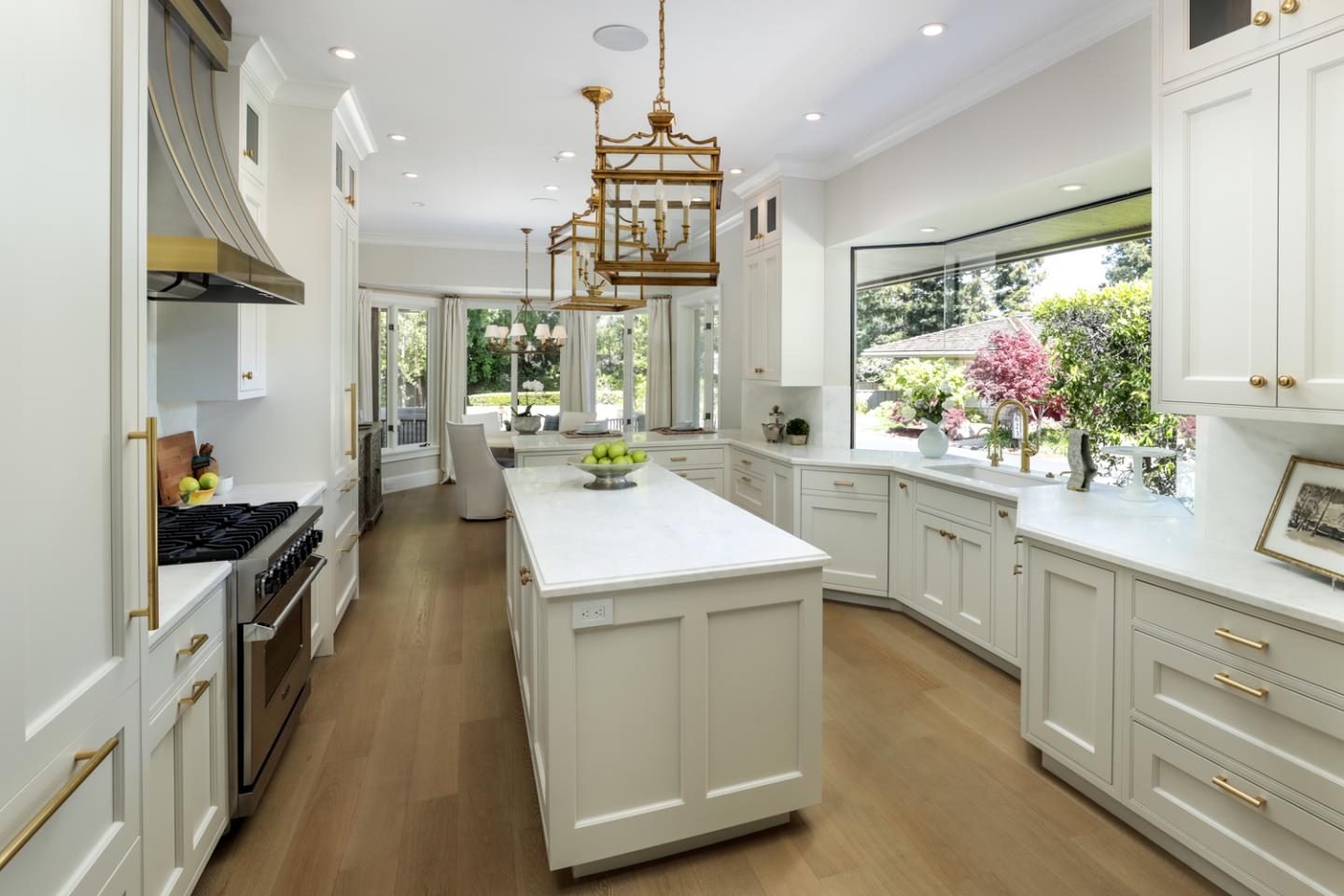 620 Morningside Circle Los Altos, CA 94022 - Photo 8 of 32 a kitchen that has a lot of white cabinets and stainless steel appliances