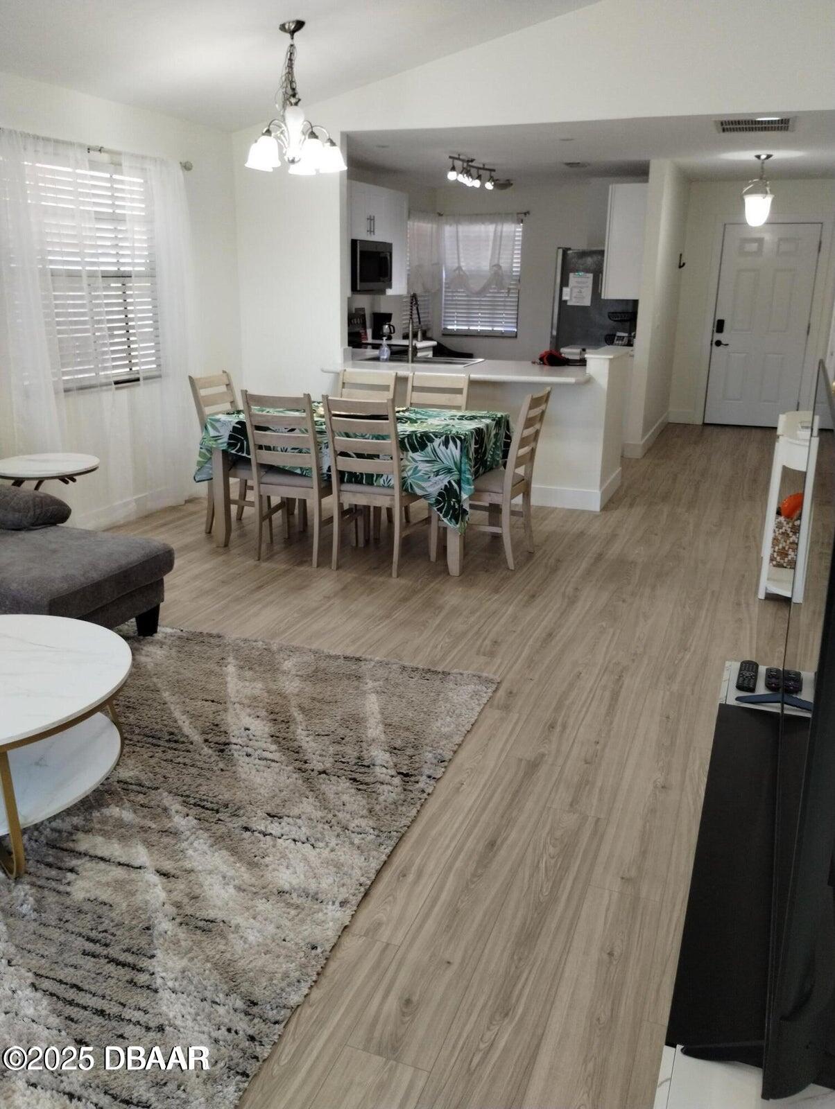 962 Stonybrook Circle Port Orange, FL 32127 - Photo 4 of 15 a view of a dining room with furniture