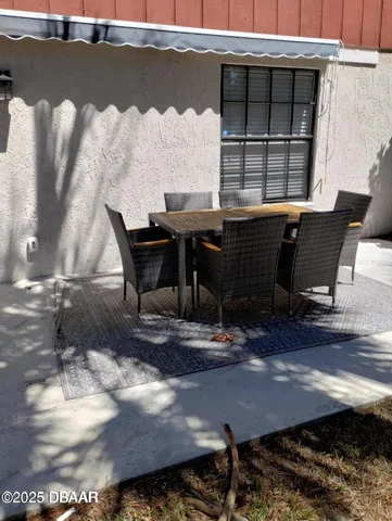 a view of a outdoor space with lounge chair