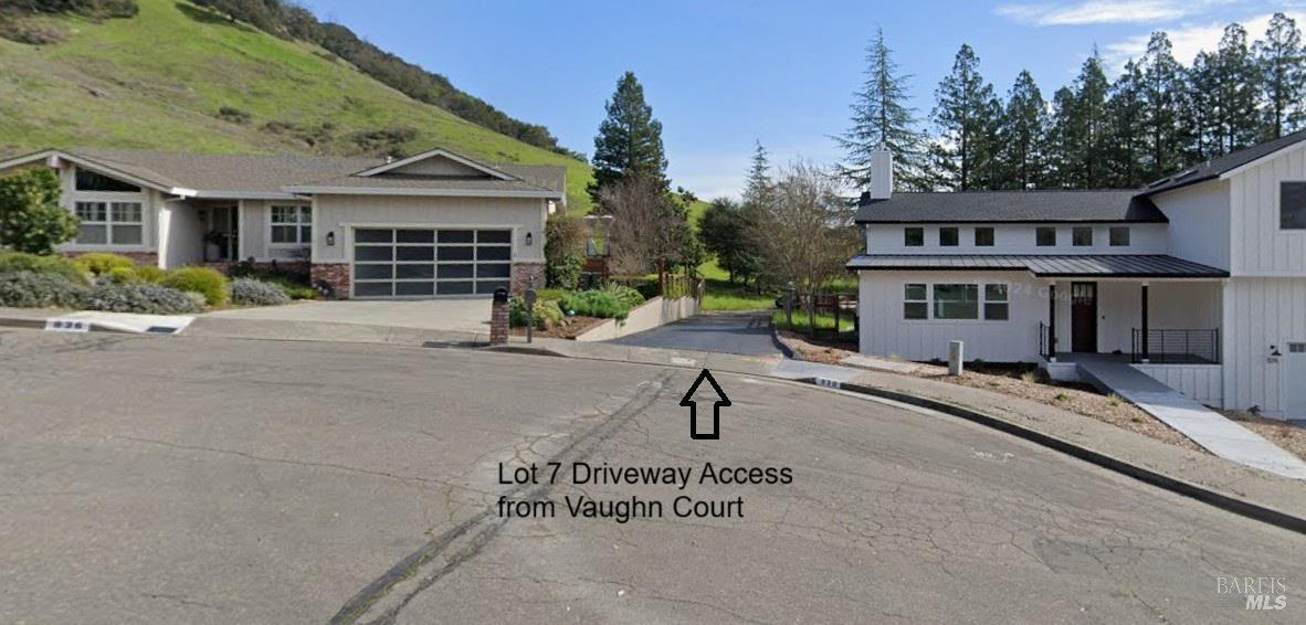 833 Vaughn Court Santa Rosa, CA 95409 - Photo 1 of 2 a house with a bench in front of it