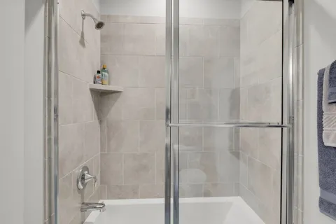 a work room with furniture and windows