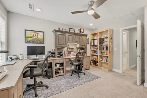 a bathroom with a sink a vanity and a mirror