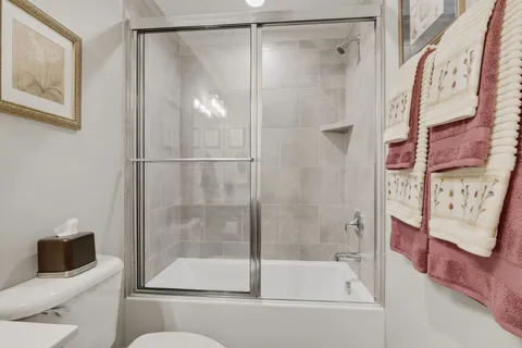 a room with lots of wooden furniture and a wooden floor