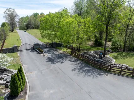 an aerial view of a house with a garden