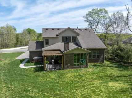 an aerial view of a city with lots of residential buildings