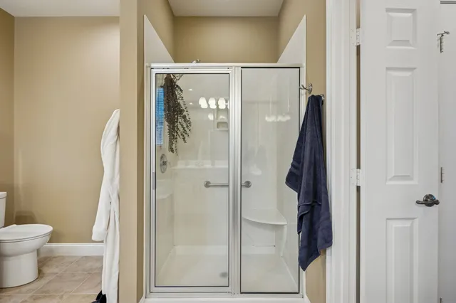 a view of storage and utility room with washer and dryer