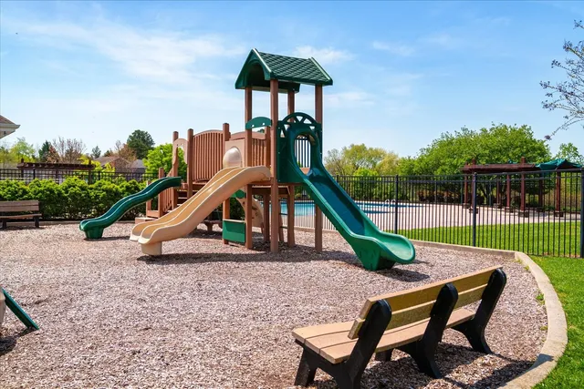 a view of swimming pool with a yard