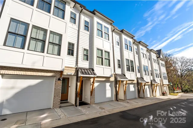 a view of a building with a street