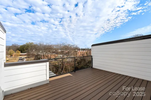 a view of deck with wooden floor and fence