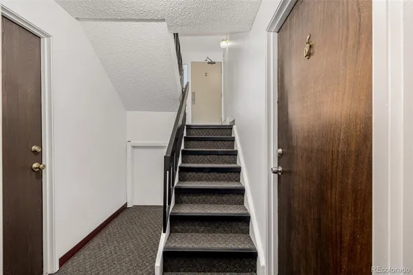 a view of an entryway with staircase