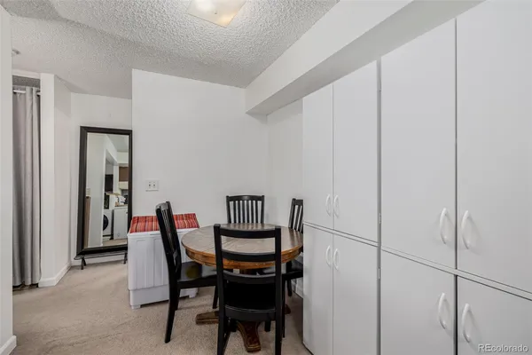 a view of a dining room with furniture