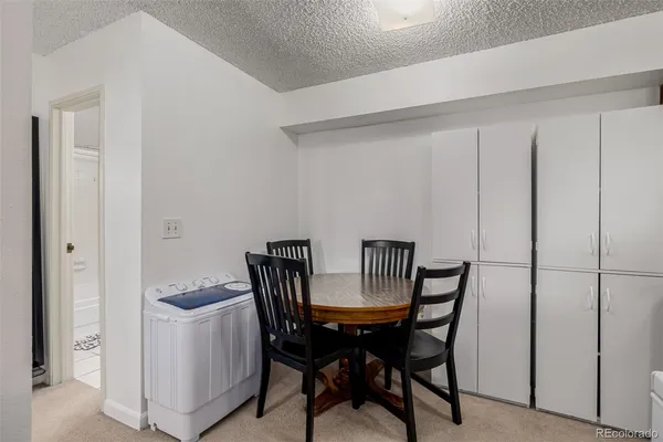 a view of a dining room with furniture