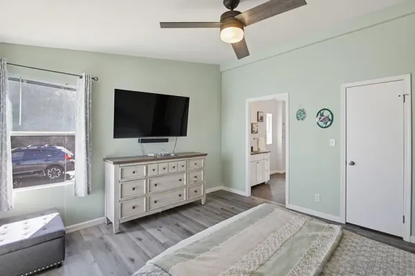 a bathroom with a bath tub and a shower