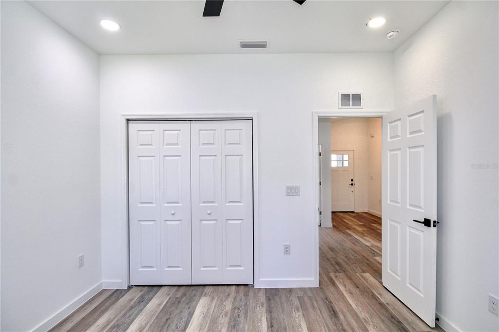 454 Bonnie Road Northwest Lake Placid, FL 33852 - Photo 28 of 30 wooden floor with white walls